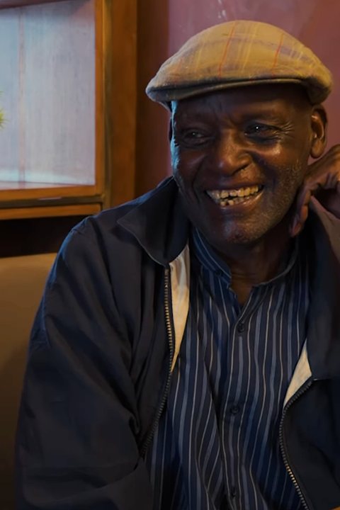 Mzee Daniel smiling, house painter from Lavington, Nairobi